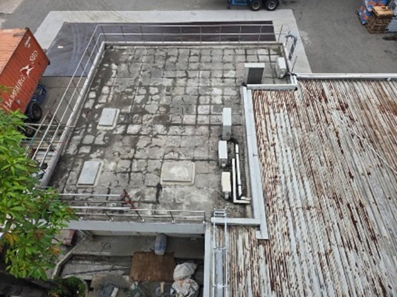 Reinforced concrete roof slab prepared for membrane repair