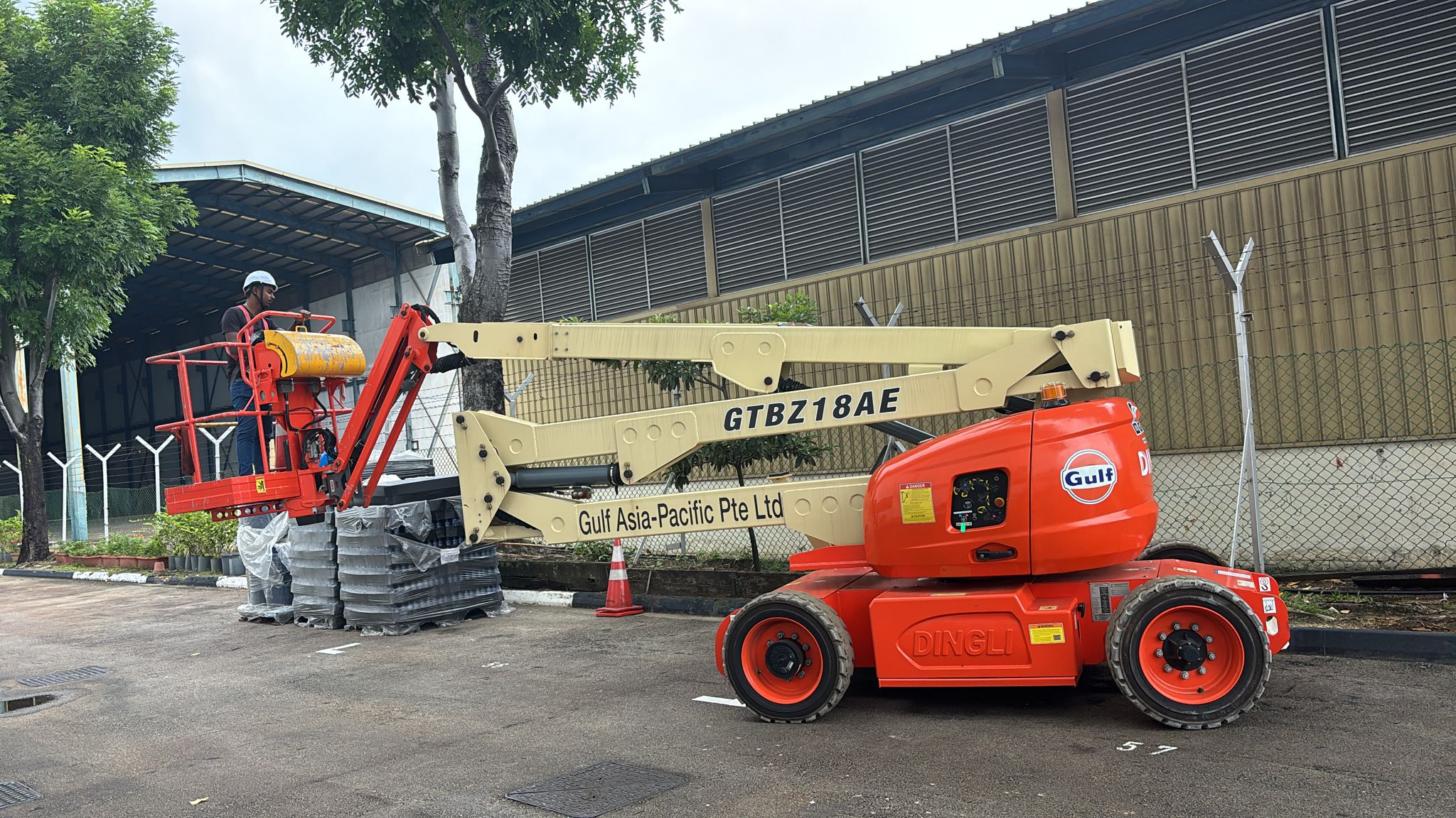 ASU team performing working at height using articulating boom lift